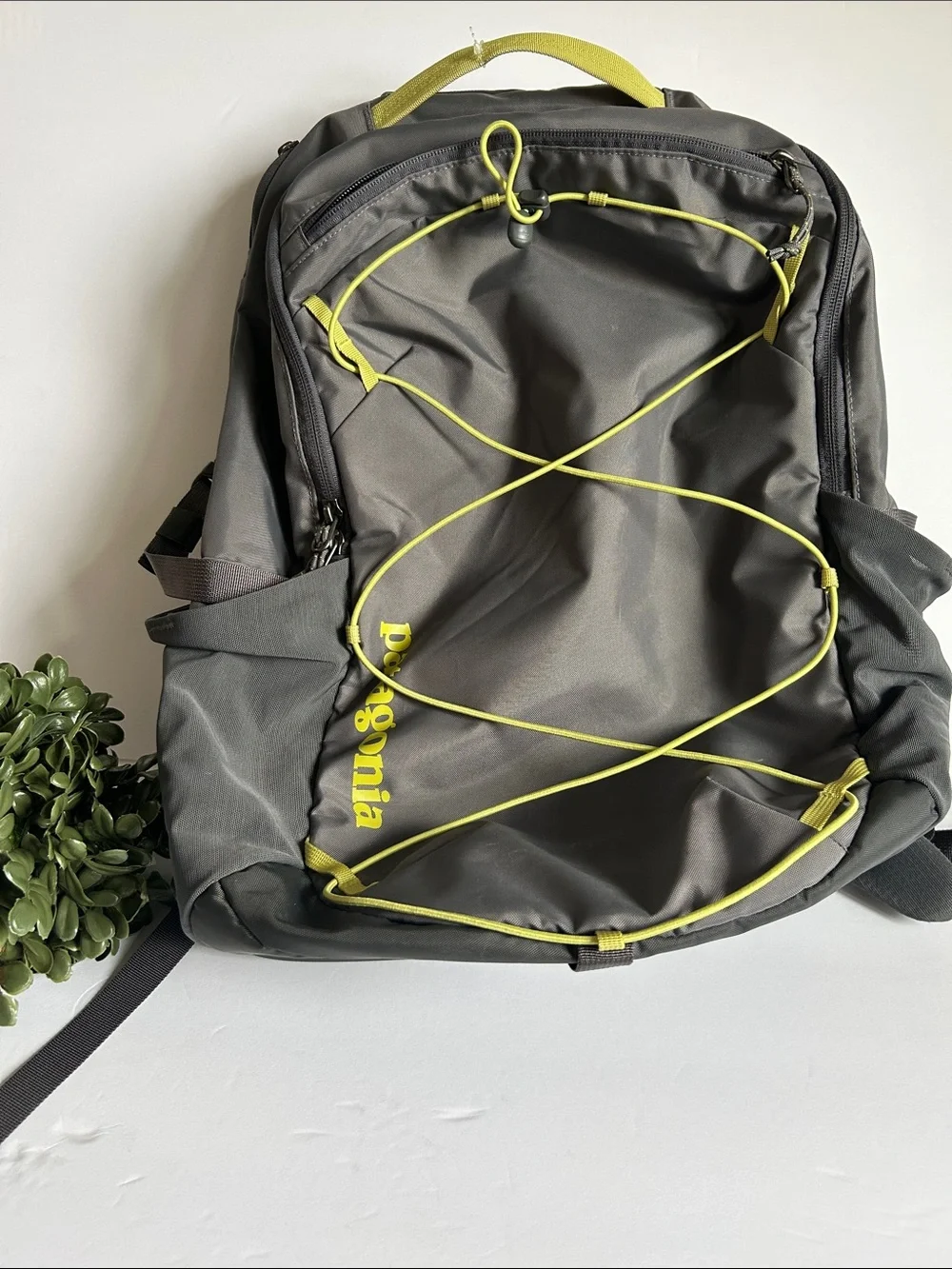 Patagonia Gray Backpack with Yellow Bungee Accents